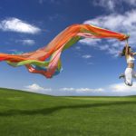 1207284 - young beautiful woman jumping with a scarf