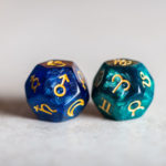 Astrology Dice with zodiac symbol of Aries and its ruling planet Mars