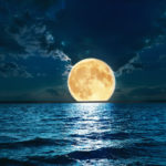 47514966 - super moon over water