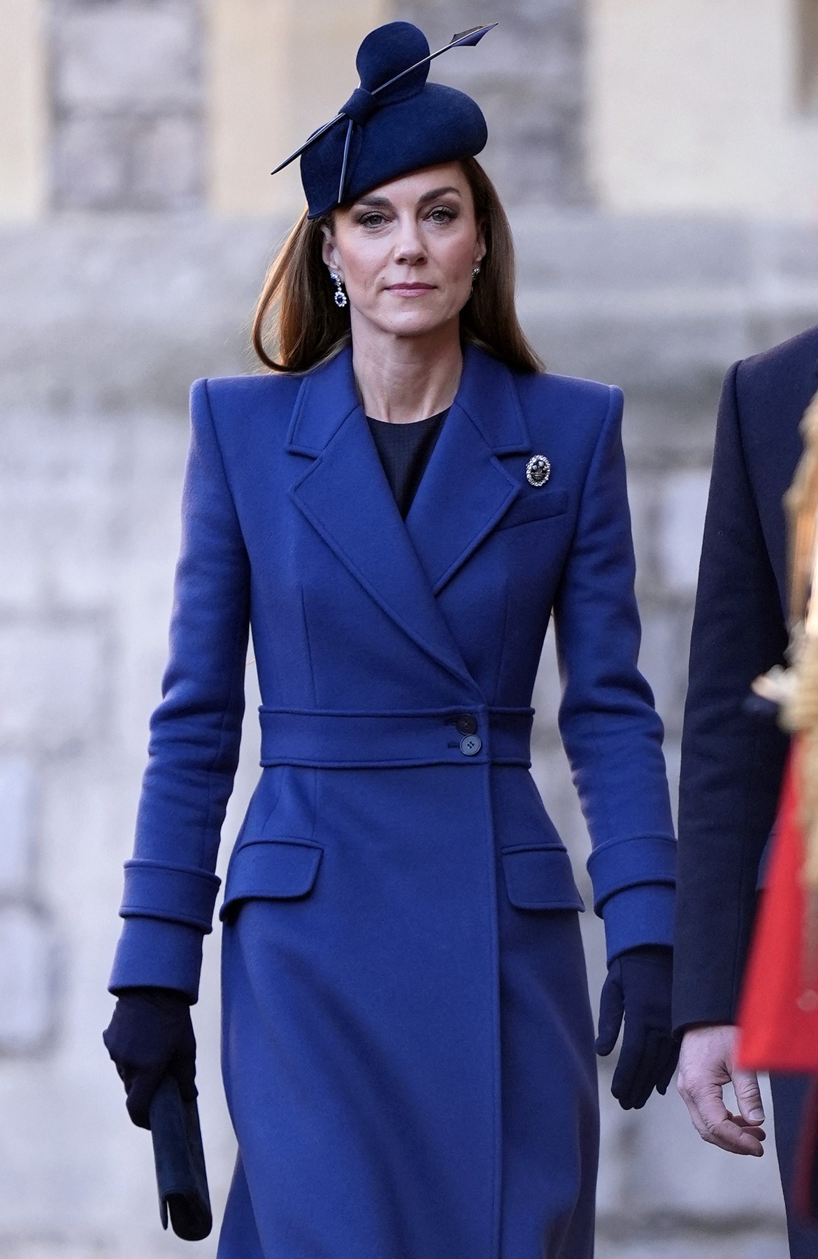 Kate mai purtase paltonul de Crăciun 2023 și din nou în decembrie 2025.Sursa foto: James Whatling / The Mega Agency / Profimedia